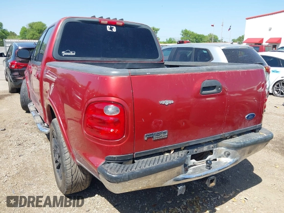 2002 Ford F-150 XLT with VIN 1FTRW07682KC33857, listed as a IAAI auction lot 41870137 with 185,480 mi miles. Bid and sale history available at carsss.com. Image 3.