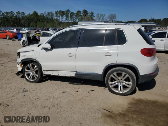 2012 Volkswagen Tiguan SEL with VIN WVGAV7AX9CW530331, listed as a Copart auction lot 50129405 with 141,387 mi miles and Salvage Title. Bid and sale history available at DreamBid. Image 2.