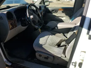 2003 Isuzu Ascender with VIN 4NUET16P532101863, listed as a Copart auction lot 75560984 with 195,883 mi miles and Salvage title. Bid and sale history available at DreamBid. Image 7.