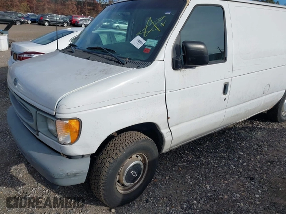 2002 Ford Econoline Cargo with VIN 1FTRE14262HB84357, listed as a IAAI auction lot 40880551 with 123,183 mi miles. Bid and sale history available at carsss.com. Image 6.