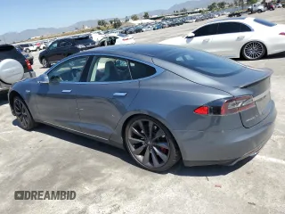 2013 Tesla Model S Performance с VIN 5YJSA1CP1DFP26946, выставлен на аукционе Copart как лот 50133094 с пробегом 80 045 миль миль и Списание • Salvage title. История ставок и продаж доступна на DreamBid. Изображение 2.