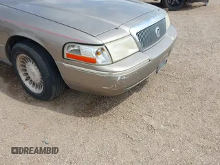 2004 Mercury Grand Marquis GS with VIN 2MEFM74W94X671873, listed as a IAAI auction lot 42130841 with 92,757 mi miles and . Bid and sale history available at DreamBid. Image 6.
