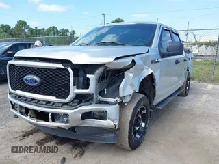 2019 Ford F-150 XL with VIN 1FTEW1E55KKC58276, listed as a IAAI auction lot 42133235 with 97,032 mi miles. Bid and sale history available at carsss.com. Image 2.