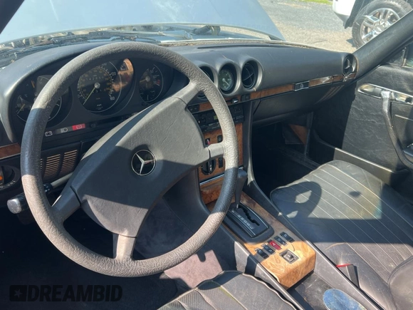1984 Mercedes-Benz SL with VIN WDB1070421A009542, listed as a Copart auction lot 65327125 with 142,656 mi miles and Clean title. Bid and sale history available at DreamBid. Image 9.