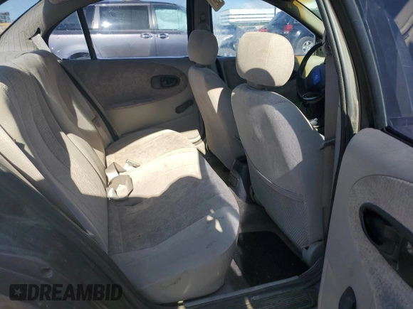 1999 Saturn SL with VIN 1G8ZK527XXZ136922, listed as a Copart auction lot 86704404 with 134,897 mi miles and Salvage Title. Bid and sale history available at carsss.com. Image 10.