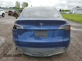 2024 Tesla Model Y Long Range z VIN 7SAYGDEE0RA286070, wystawiony jako Copart lot #58200425 z przebiegiem 16 881 mil mil oraz Szkoda całkowita • Salvage title. Historia ofert i sprzedaży dostępna na DreamBid. Obrazek 6.
