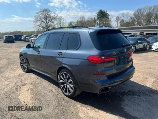 2022 BMW X7 M50i z VIN 5UXCX6C09N9K44917, wystawiony jako Copart lot #54822275 z przebiegiem 123 855 mil mil oraz Tytuł czysty. Historia ofert i sprzedaży dostępna na DreamBid. Obrazek 2.