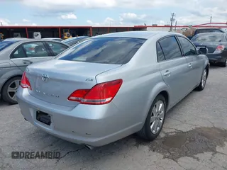 2006 Toyota Avalon XL with VIN 4T1BK36B86U127735, listed as a IAAI auction lot 42112001 with 173,861 mi miles. Bid and sale history available at carsss.com. Image 4.
