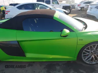 2017 Audi R8 z VIN WUAVACFX5H7903923, wystawiony jako IAAI lot #41348191 z przebiegiem 53 883 mil mil oraz . Historia ofert i sprzedaży dostępna na DreamBid. Obrazek 13.