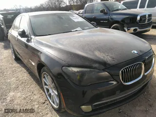 2011 BMW 7 Series 740i with VIN WBAKA4C55BC612634, listed as a IAAI auction lot 35404385 with 156,003 mi miles. Bid and sale history available at carsss.com. Image 1.