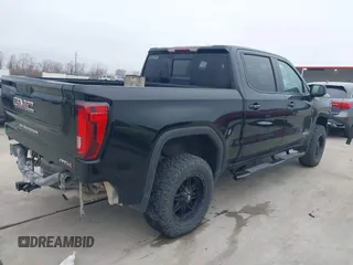 2021 GMC Sierra 1500 AT4 with VIN 3GTP9EED9MG298241, listed as a IAAI auction lot 41422308 with 90,052 mi miles. Bid and sale history available at carsss.com. Image 4.