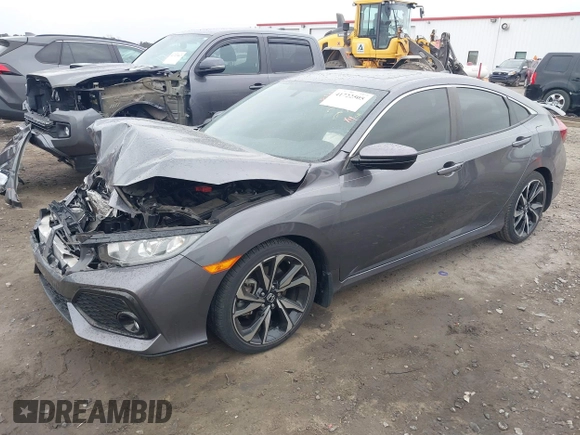 2019 Honda Civic Si z VIN 2HGFC1E52KH701117, wystawiony jako IAAI lot #41722505 z przebiegiem 64 085 mil mil oraz . Historia ofert i sprzedaży dostępna na DreamBid. Obrazek 17.