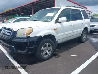 2007 Honda Pilot EX-L z VIN 5FNYF18627B024506, wystawiony jako IAAI lot #42220694 z przebiegiem 258 535 mil mil oraz . Historia ofert i sprzedaży dostępna na DreamBid. Obrazek 2.