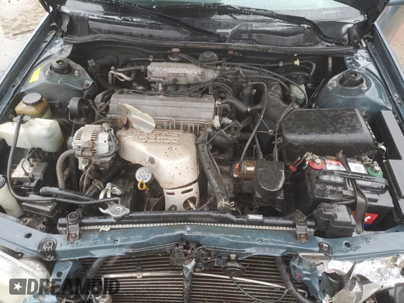 2001 Toyota Camry CE z VIN JT2BG22K710561238, wystawiony jako Copart lot #56686255 z przebiegiem Nie podano mil oraz Szkoda całkowita • Salvage title. Historia ofert i sprzedaży dostępna na DreamBid. Obrazek 11.