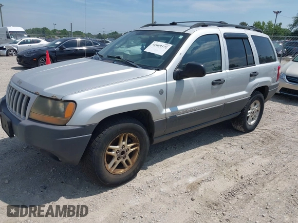 2004 Jeep Grand Cherokee Laredo with VIN 1J4GW48N94C420407, listed as a IAAI auction lot 42689372 with 217,768 mi miles and . Bid and sale history available at DreamBid. Image 2.