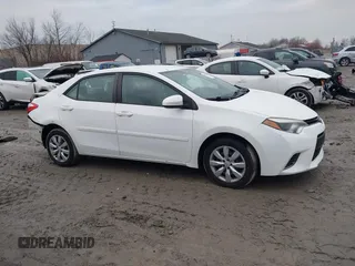 2015 Toyota Corolla L with VIN 5YFBURHE4FP330420, listed as a IAAI auction lot 41059296 with 73,689 mi miles and . Bid and sale history available at DreamBid. Image 14.
