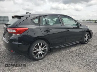 2018 Subaru Impreza with VIN 4S3GTAF65J1751579, listed as a Copart auction lot 61690535 with 77,316 mi miles and Salvage title. Bid and sale history available at DreamBid. Image 3.
