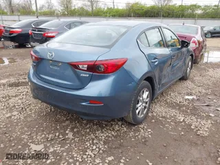 2016 Mazda Mazda3 i Sport with VIN JM1BM1U74G1317617, listed as a IAAI auction lot 42017021 with 159,828 mi miles. Bid and sale history available at carsss.com. Image 4.