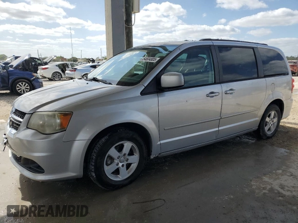 2012 Dodge Grand Caravan SXT with VIN 2C4RDGCG3CR373377, listed as a Copart auction lot 54604805 with 168,067 mi miles and Salvage Title. Bid and sale history available at DreamBid. Image 1.