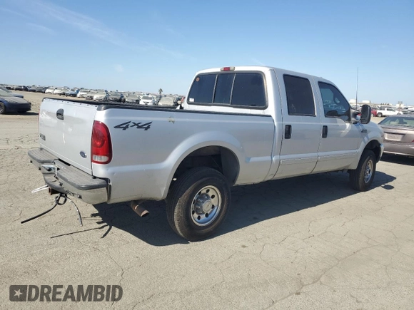 2002 Ford F-250 XL with VIN 1FTNW21L92ED10310, listed as a Copart auction lot 59132935 with 217,885 mi miles and Salvage title. Bid and sale history available at DreamBid. Image 3.