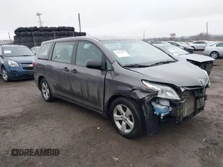 2015 Toyota Sienna L with VIN 5TDZK3DC9FS582287, listed as a IAAI auction lot 41465131 with 156,056 mi miles. Bid and sale history available at carsss.com. Image 1.