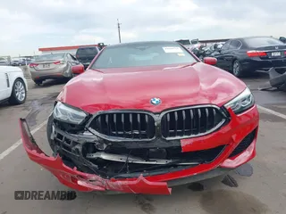 2022 BMW 8 Series M850i z VIN WBAGV8C04NCH90015, wystawiony jako IAAI lot #42020711 z przebiegiem 39 801 mil mil oraz . Historia ofert i sprzedaży dostępna na DreamBid. Obrazek 12.