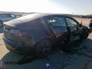 2021 Tesla Model 3 Standard Range Plus with VIN 5YJ3E1EA2MF977007, listed as a Copart auction lot 48516075 with Not Provided miles and Salvage Title. Bid and sale history available at DreamBid. Image 3.