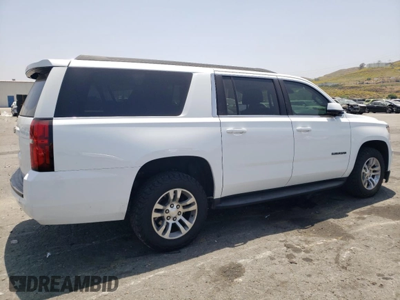 2019 Chevrolet Suburban LT with VIN 1GNSCHKCXKR207233, listed as a Copart auction lot 55410464 with 107,500 mi miles and Salvage Title. Bid and sale history available at DreamBid. Image 3.