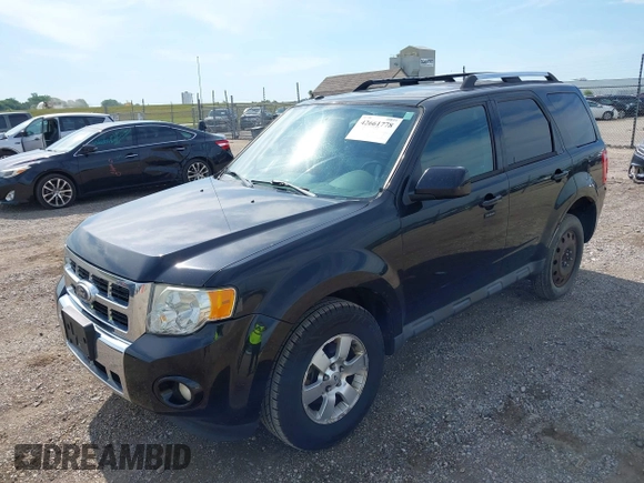 2011 Ford Escape Limited z VIN 1FMCU0EG7BKA13807, wystawiony jako IAAI lot #42661778 z przebiegiem 213 824 mil mil oraz . Historia ofert i sprzedaży dostępna na DreamBid. Obrazek 2.
