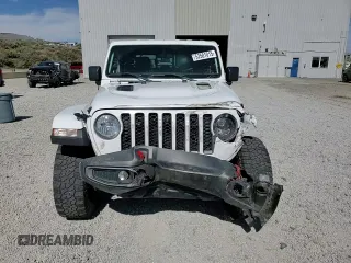 2022 Jeep Gladiator Rubicon z VIN 1C6JJTBG4NL135430, wystawiony jako Copart lot #52581015 z przebiegiem 54 553 mil mil oraz Szkoda całkowita • Salvage title. Historia ofert i sprzedaży dostępna na DreamBid. Obrazek 11.
