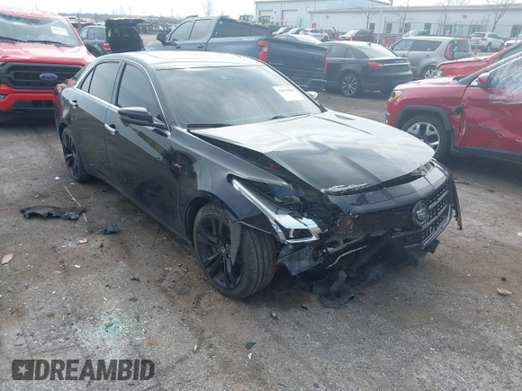 2014 Cadillac CTS Vsport Premium RWD z VIN 1G6AV5S8XE0143389, wystawiony jako IAAI lot #42021009 z przebiegiem 95 102 mil mil oraz . Historia ofert i sprzedaży dostępna na DreamBid. Obrazek 1.