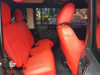 2014 Jeep Wrangler Unlimited Sahara with VIN 1C4BJWEG6EL107526, listed as a IAAI auction lot 42030244 with 69,077 mi miles. Bid and sale history available at carsss.com. Image 8.