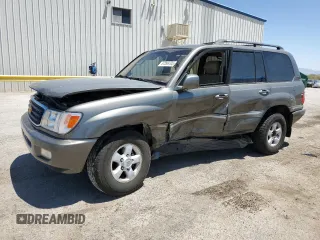 2000 Toyota Land Cruiser z VIN JT3HT05J1Y0112351, wystawiony jako Copart lot #57299705 z przebiegiem 249 433 mil mil oraz Szkody całkowita. Historia ofert i sprzedaży dostępna na DreamBid. Obrazek 1.