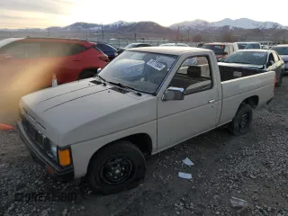 1986 Nissan Hardbody E z VIN JN6ND11S1GW037479, wystawiony jako Copart lot #81775934 z przebiegiem 389 841 mil mil oraz Szkody całkowita. Historia ofert i sprzedaży dostępna na DreamBid. Obrazek 1.