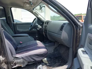2007 Dodge Dakota SLT z VIN 1D7HW48P27S198997, wystawiony jako IAAI lot #42411491 z przebiegiem 183 825 mil mil oraz . Historia ofert i sprzedaży dostępna na DreamBid. Obrazek 5.