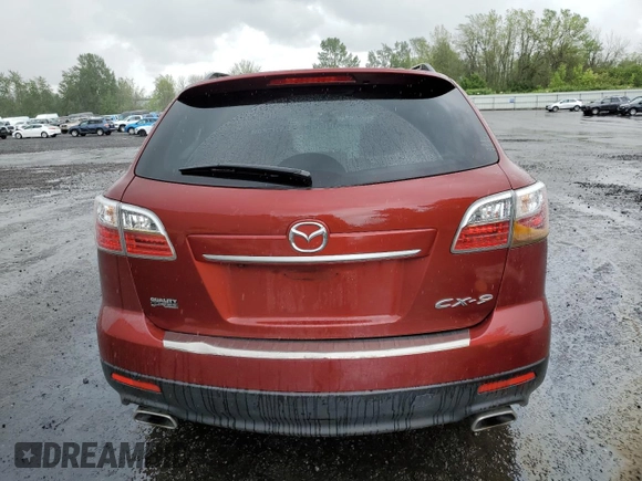 2012 Mazda CX-9 Grand Touring z VIN JM3TB2DV8C0340811, wystawiony jako Copart lot #56756905 z przebiegiem 102 972 mil mil oraz Szkoda całkowita • Salvage title. Historia ofert i sprzedaży dostępna na DreamBid. Obrazek 6.