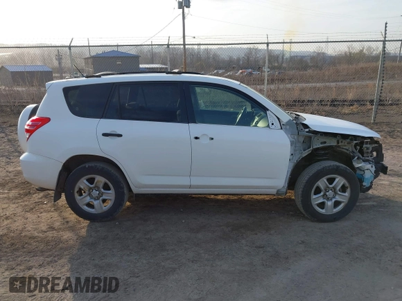 2009 Toyota RAV4 with VIN JTMBF33VX9D001291, listed as a IAAI auction lot 41792376 with 104,318 mi miles and . Bid and sale history available at DreamBid. Image 14.