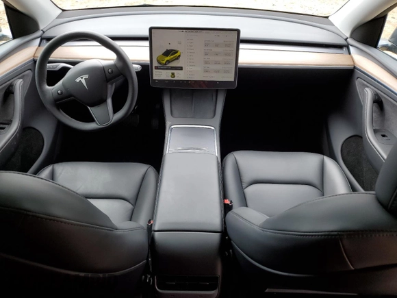 2023 Tesla Model Y Long Range z VIN 7SAYGDEE5PA164270, wystawiony jako Copart lot #50260835 z przebiegiem 17 340 mil mil oraz Szkoda całkowita • Salvage title. Historia ofert i sprzedaży dostępna na DreamBid. Obrazek 8.