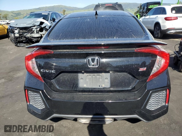 2018 Honda Civic Si with VIN 2HGFC1E51JH709059, listed as a Copart auction lot 52453615 with 90,917 mi miles and Salvage Title. Bid and sale history available at DreamBid. Image 6.