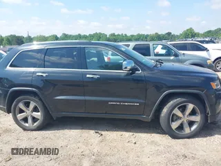 2014 Jeep Grand Cherokee Limited with VIN 1C4RJEBT6EC187548, listed as a IAAI auction lot 42210601 with 138,451 mi miles and . Bid and sale history available at DreamBid. Image 14.