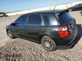 2006 Kia Spectra with VIN KNAFE162065241706, listed as a Copart auction lot 68949914 with 153,169 mi miles and Salvage Title. Bid and sale history available at carsss.com. Image 2.