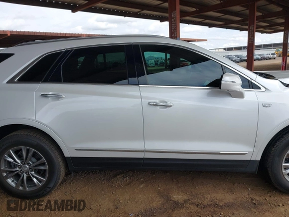 2021 Cadillac XT5 FWD Premium Luxury with VIN 1GYKNCRS5MZ224957, listed as a IAAI auction lot 41794648 with 28,540 mi miles and . Bid and sale history available at carsss.com. Image 13.