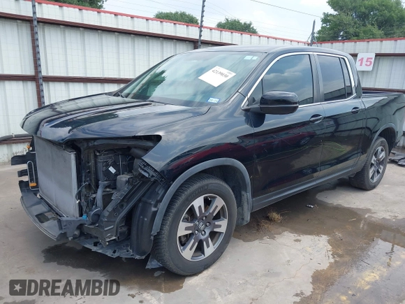 2017 Honda Ridgeline RTL z VIN 5FPYK2F55HB011463, wystawiony jako IAAI lot #42139030 z przebiegiem 59 066 mil mil oraz . Historia ofert i sprzedaży dostępna na DreamBid. Obrazek 23.