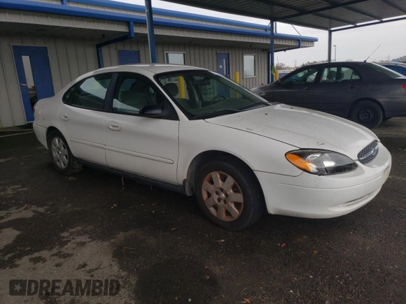 2003 Ford Taurus LX Standard with VIN 1FAFP52U53G280700, listed as a Copart auction lot 87488014 with 128,020 mi miles and Salvage title. Bid and sale history available at DreamBid. Image 4.