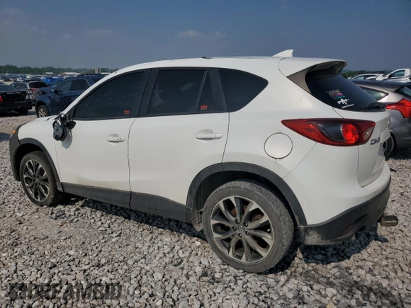 2016 Mazda CX-5 Grand Touring z VIN JM3KE4DY7G0864109, wystawiony jako Copart lot #59635865 z przebiegiem Nie podano mil oraz Czysty tytuł • Clean title. Historia ofert i sprzedaży dostępna na DreamBid. Obrazek 2.