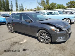 2017 Mazda 6 Grand Touring with VIN JM1GL1W5XH1133708, listed as a Copart auction lot 49009255 with 115,259 mi miles and Salvage Title. Bid and sale history available at carsss.com. Image 4.