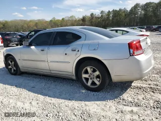 2010 Dodge Charger SXT with VIN 2B3CA3CV7AH210466, listed as a Copart auction lot 50699505 with 205,829 mi miles and Salvage Title. Bid and sale history available at carsss.com. Image 2.