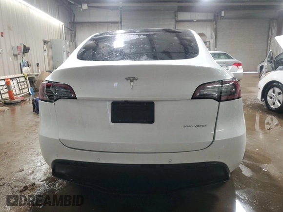 2021 Tesla Model Y Long Range with VIN 5YJYGDEE4MF231016, listed as a Copart auction lot 50908475 with 35,216 mi miles and Salvage Title. Bid and sale history available at DreamBid. Image 6.
