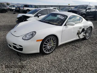 2007 Porsche 718 Cayman z VIN WP0AA29897U761053, wystawiony jako Copart lot #71669104 z przebiegiem 29 454 mil mil oraz Szkoda całkowita • Salvage title. Historia ofert i sprzedaży dostępna na DreamBid. Obrazek 1.