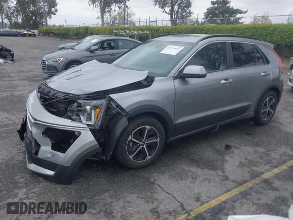 2023 Kia Niro LX with VIN KNDCP3LE5P5090549, listed as a IAAI auction lot 41874882 with 25,894 mi miles. Bid and sale history available at carsss.com. Image 2.